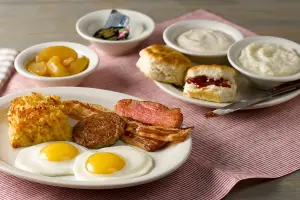"Cracker Barrel 2025 breakfast menu featuring new and classic options like pancakes, sausage, Sunrise Sampler, biscuits, and hashbrown casserole"

