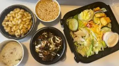 "Cracker Barrel sides menu featuring mac n’ cheese, mashed potatoes, fried apples, hashbrown casserole, and fresh seasonal veggies"

