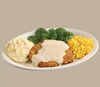 Crispy country fried steak topped with creamy white gravy