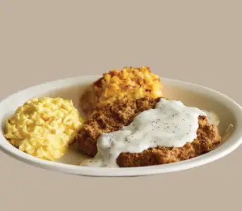 “Grandpa’s Country Fried Breakfast with crispy fried chicken and eggs at Cracker Barrel”

