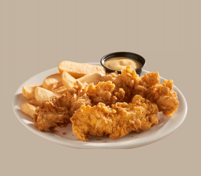 Grilled Chicken Tenders served with side dishes at Cracker Barrel