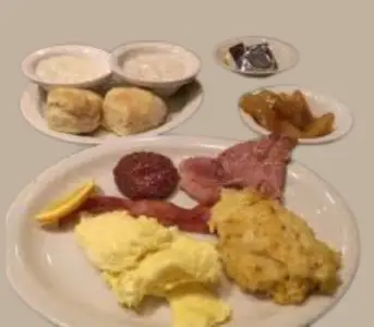 Sampler plate with chicken n’ dumplins, meatloaf, and country fried steak